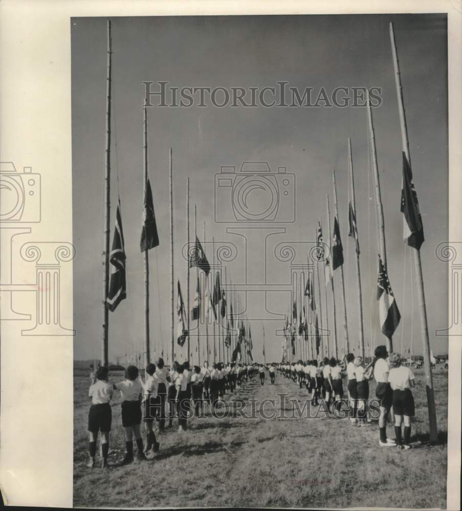 1962 Press Photo Girls from around the world raised flags at Girl Scout Roundup- Historic Images