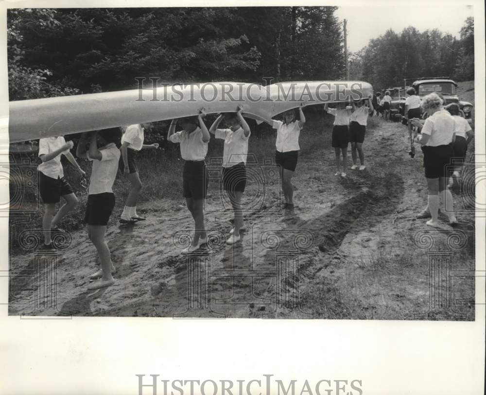 1964 Press Photo Girl Scout troop carry canoe to High Lake, Girl Scout Camp, WI- Historic Images