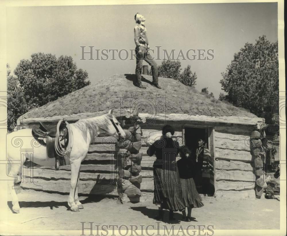 1942 Press Photo Navajo brave stands on top of his hogan, Santa Fe - mjc38765- Historic Images