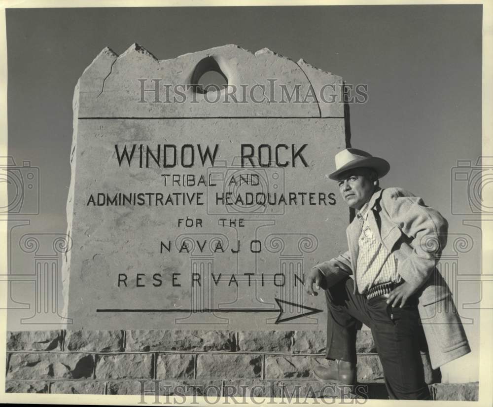 1959 Press Photo Sherrif of the Navajo Indian Reservation poses in front of sign- Historic Images