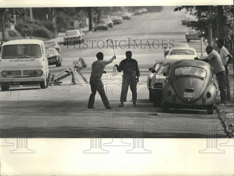Load image into Gallery viewer, 1973 Press Photo Milwaukee Waterworks employees get caught goofing off on clock
