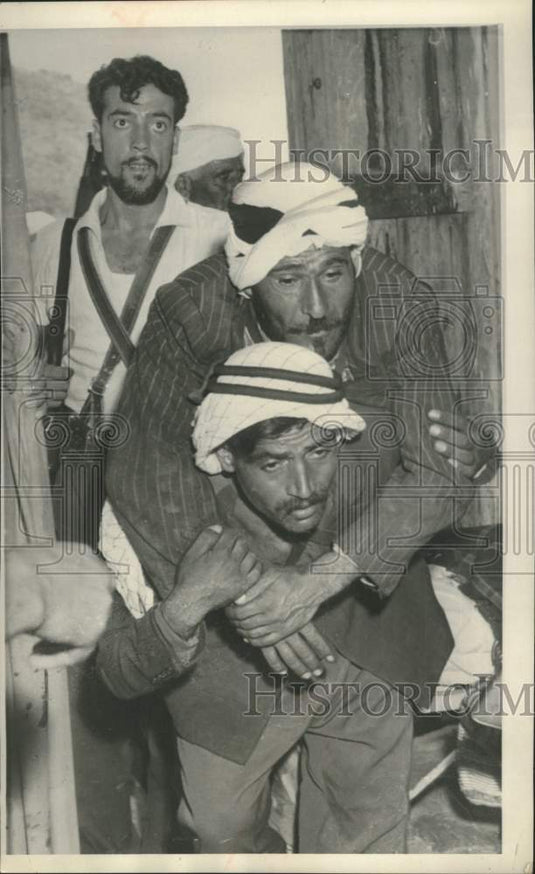 1958 Press Photo Wounded Lebanese rebel carried into a hospital near Beirut- Historic Images