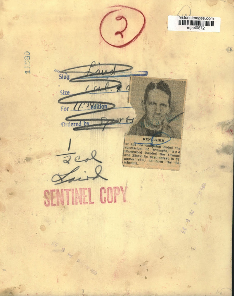 1950 Press Photo Sports athlete Ken Laird poses with hands on his knee