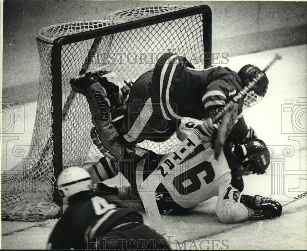 1983 Press Photo Milwaukee Admiral Gary Agnew Upends Muskegon Goalie - mjc43553- Historic Images