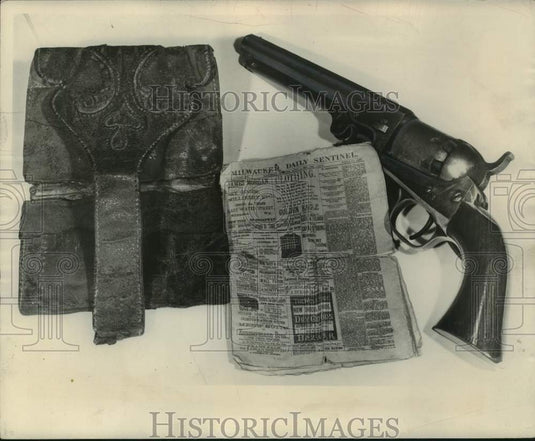 1953 Press Photo Ole Hendrickson's pistol & a Milwaukee Sentinel Newspaper- Historic Images