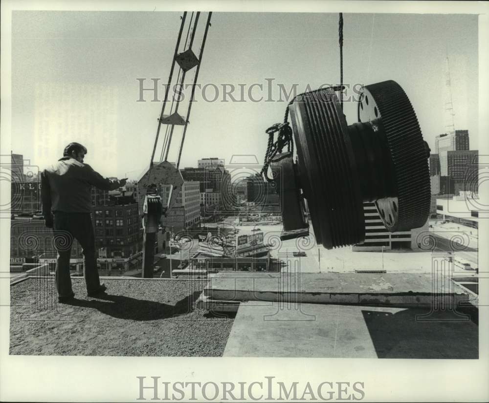 1976 Press Photo Crane above the Milwaukee Journal Parking Lot - mje01279- Historic Images