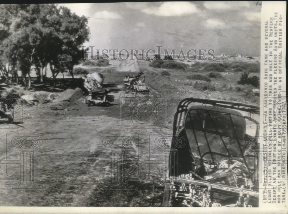 1942 Press Photo Abandoned tanks and vehicles in mud hole in Western Desert