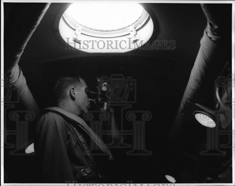 Load image into Gallery viewer, 1955 Press Photo Lieutenant Raymond Fisher in Air Force Radar Patrol Plane

