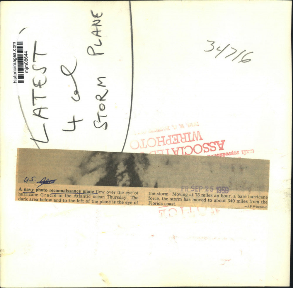 1959 Press Photo Navy reconnaissance plane over hurricane Gracie in the Atlantic