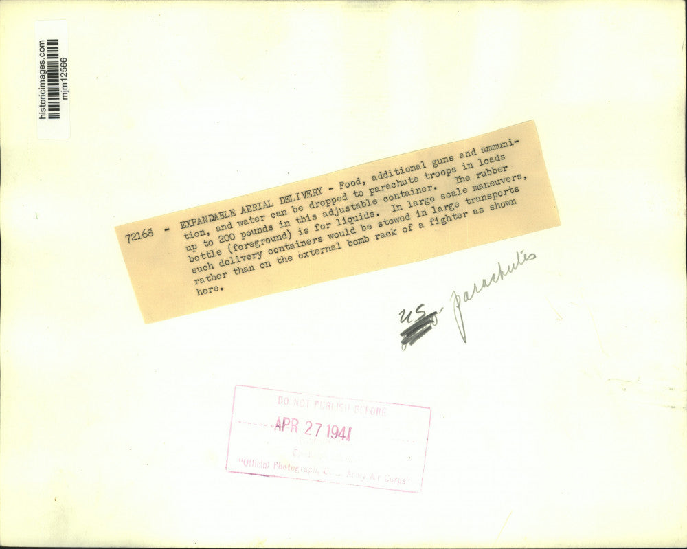 1941 Press Photo U.S. Army supply drop load with Parachute attached to plane