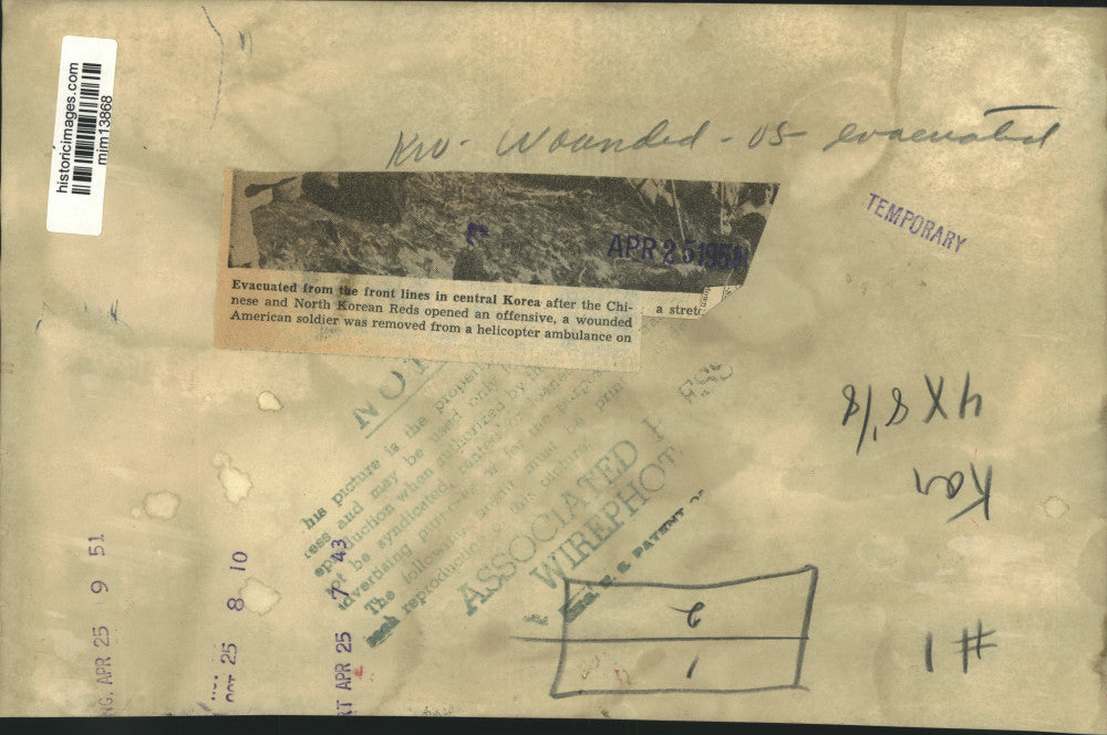 1951 Press Photo Wounded Soldier Is Removed From Helicopter, Korea - mjm13868