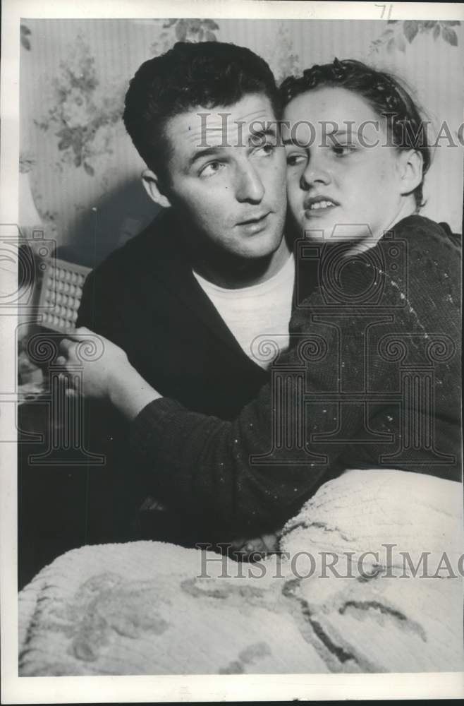 Load image into Gallery viewer, 1950 Press Photo Seamen Edward Kane hugged by Dorothy Olson in New York City
