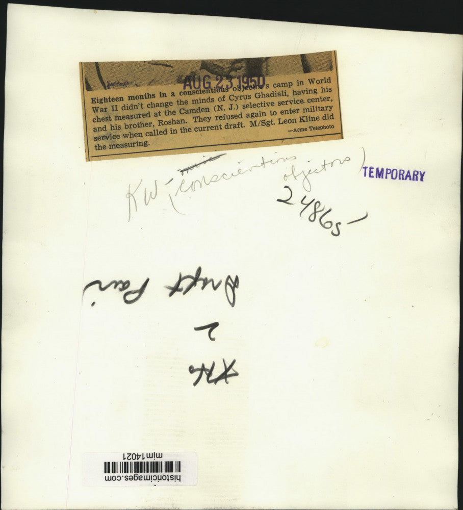 1950 Press Photo Cyrus and Roshan Ghadiali getting measured by Sergeant Kline.