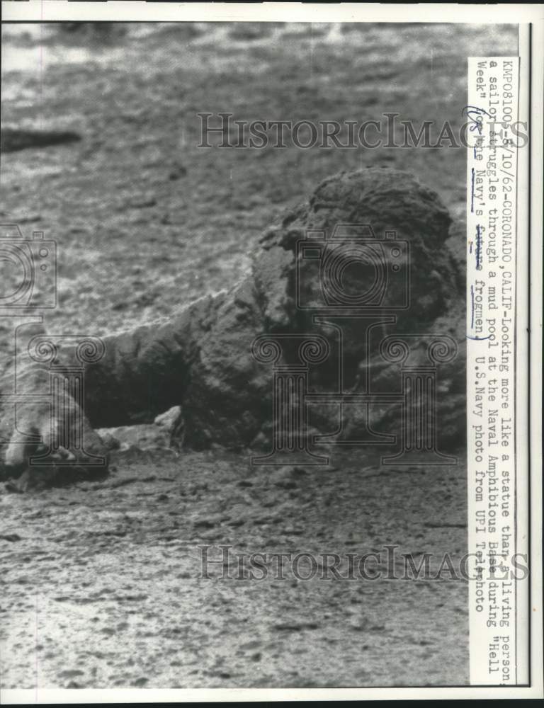 Load image into Gallery viewer, 1962 Press Photo Sailor struggles in mud for "hell week," Naval Amphibious Base
