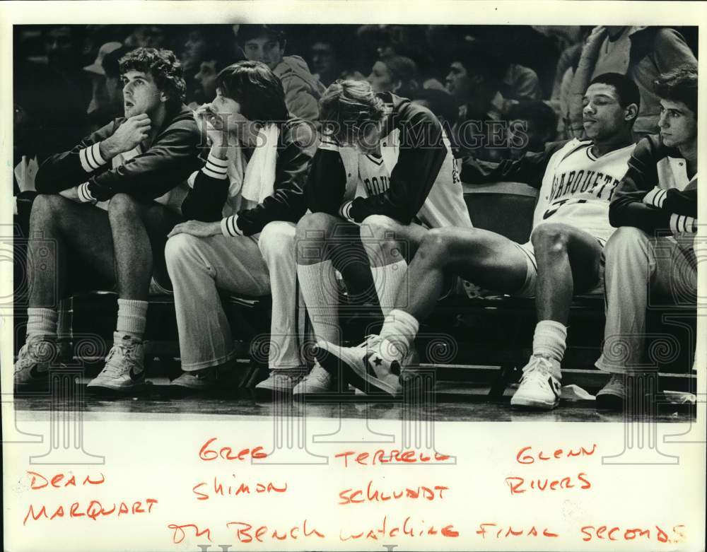 1981 Press Photo Marquette basketball players watch game from bench - mjo00568- Historic Images