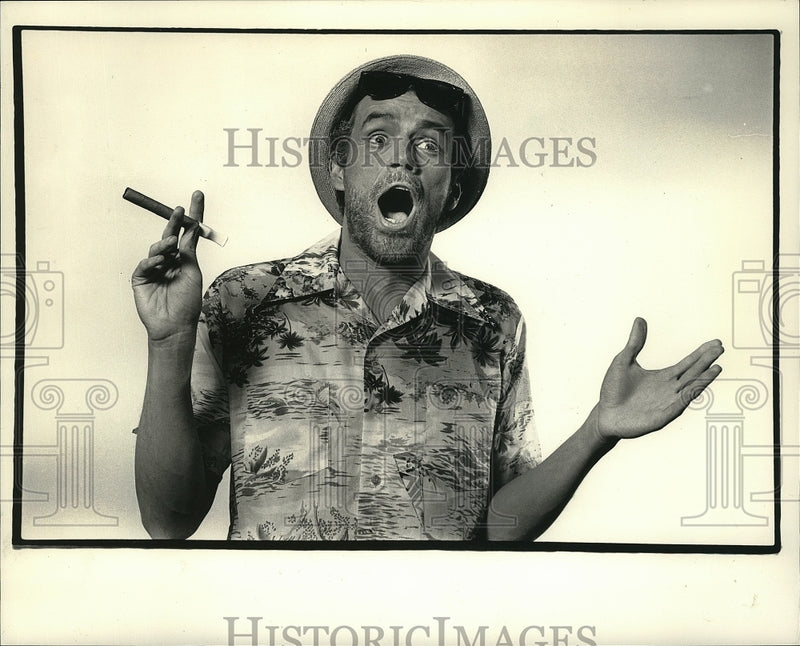 Load image into Gallery viewer, 1987 Press Photo Singer John Kuether in tropical form. - mjp04542
