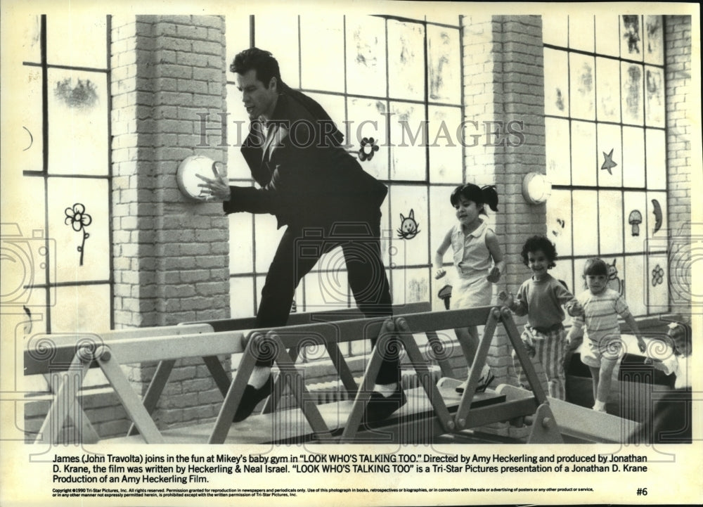 1990 Press Photo John Travolta in a scene from &quot;Look Who&#39;s Talking Too.&quot;- Historic Images