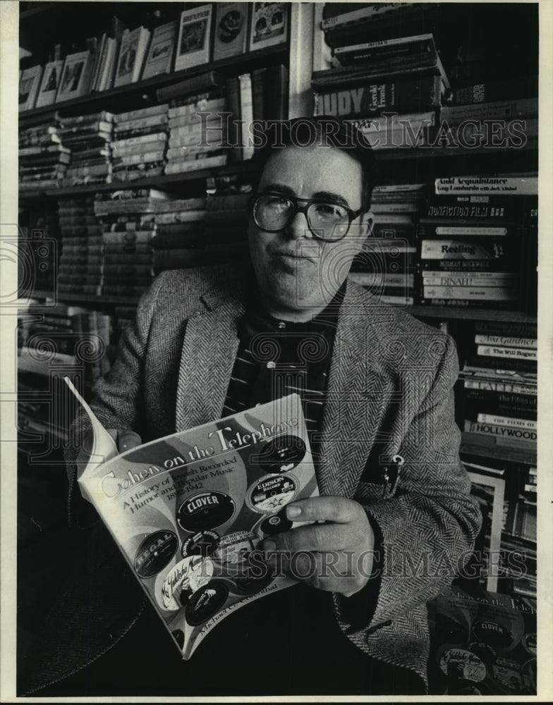 1985 Press Photo Michael G. Corenthal, Author &quot;Cohen on the Telephone&quot;- Historic Images