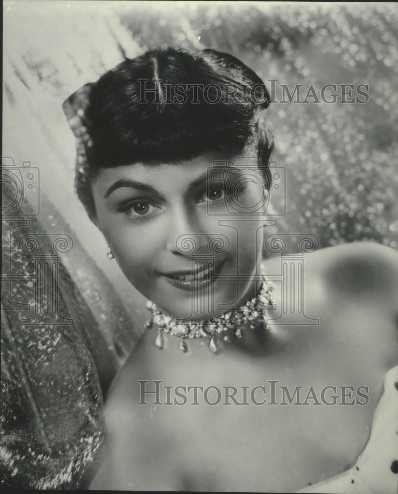 Load image into Gallery viewer, 1953 Press Photo Roberta Peters smiling in fancy jewelry and a dress
