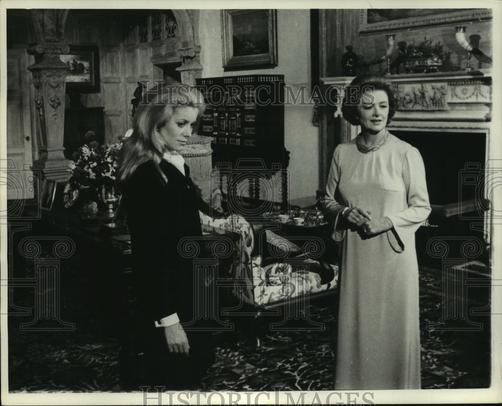 1969 Press Photo Myrna Loy, Catherine Deneuve in ornate room, April Fools Movie- Historic Images