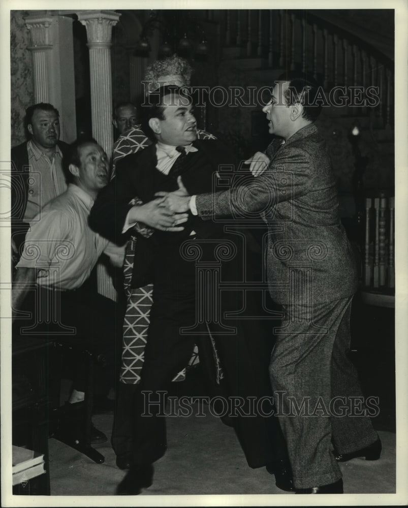 1941 Press Photo Howard G. Robinson, others in scene from Manpower - mjp35362- Historic Images