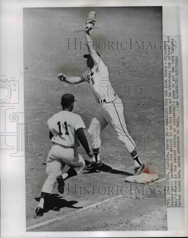 1960 Press Photo Braves Joe Adcock Stretches to Get Yankees Hector Lopez Out- Historic Images