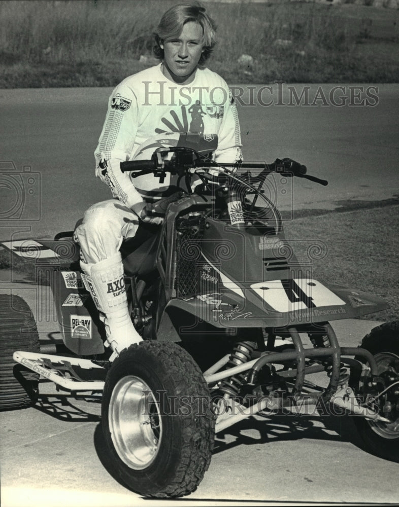 1987 Press Photo All Terrain Vehicle racer Mike Bergman sits on his race vehicle- Historic Images