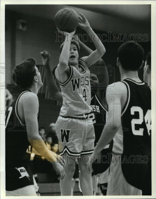 1993 Press Photo Waukesha West High School's Bryce Monson in basketball action- Historic Images