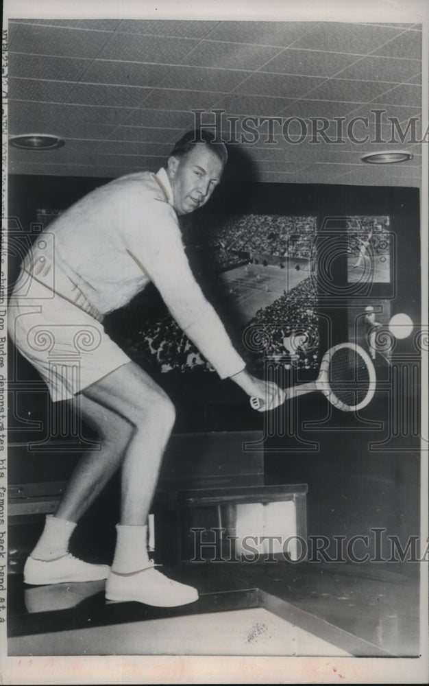 1953 Press Photo Veteran tennis champion Don Budge demonstrates famous backhand- Historic Images