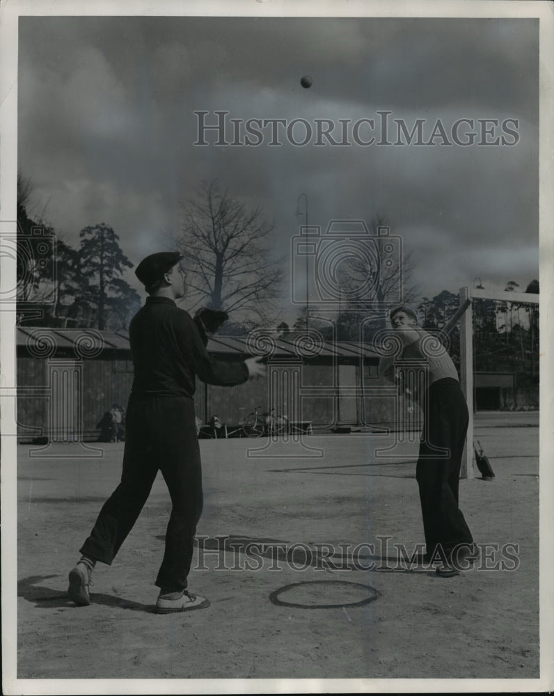 1954 Press Photo Finnish Baseball Pitcher Tosses Ball In Air To Land In Circle- Historic Images