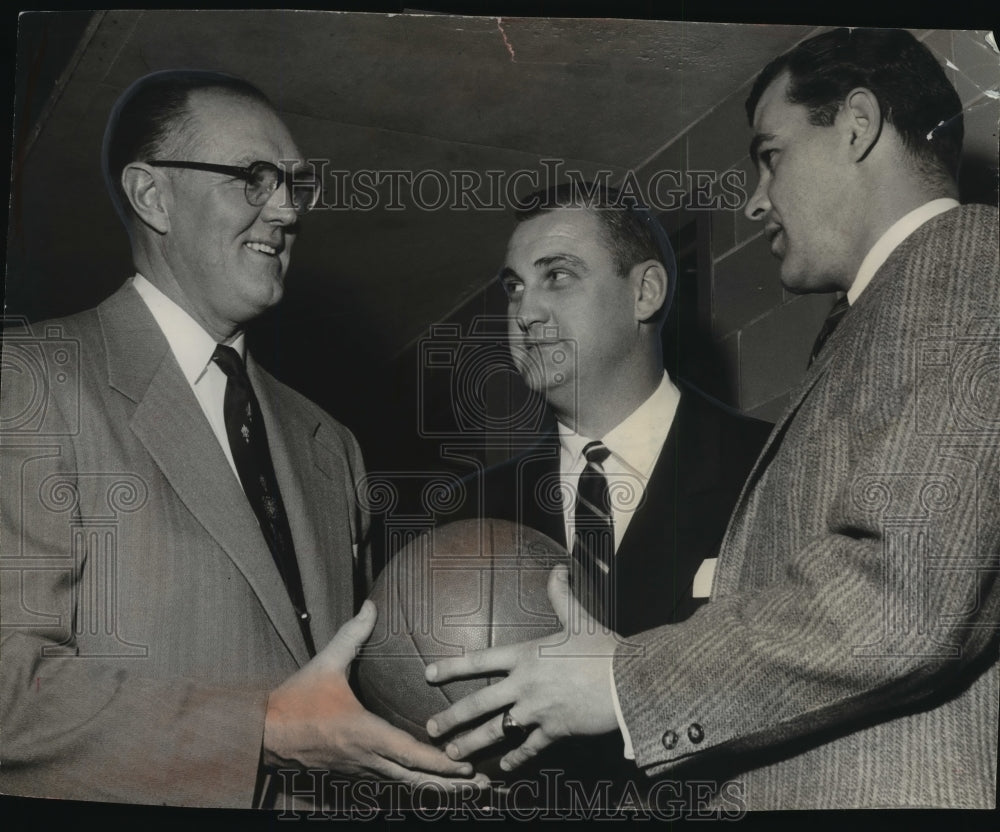 1957 Press Photo Clarence Kuehl celebrates his anniversary as a basketball coach- Historic Images