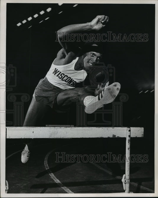 1970 Press Photo Track athlete Greg Johnson on way over hurdlers - mjt03949- Historic Images