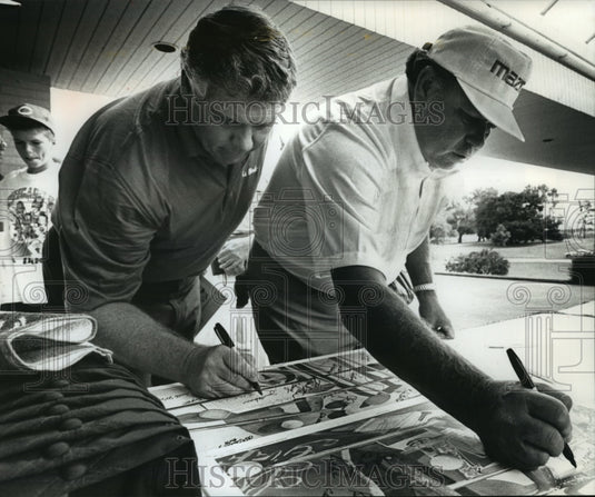 1990 Press Photo Golfers Jim O'Hern (left) and Orville Moody autograph poster.- Historic Images