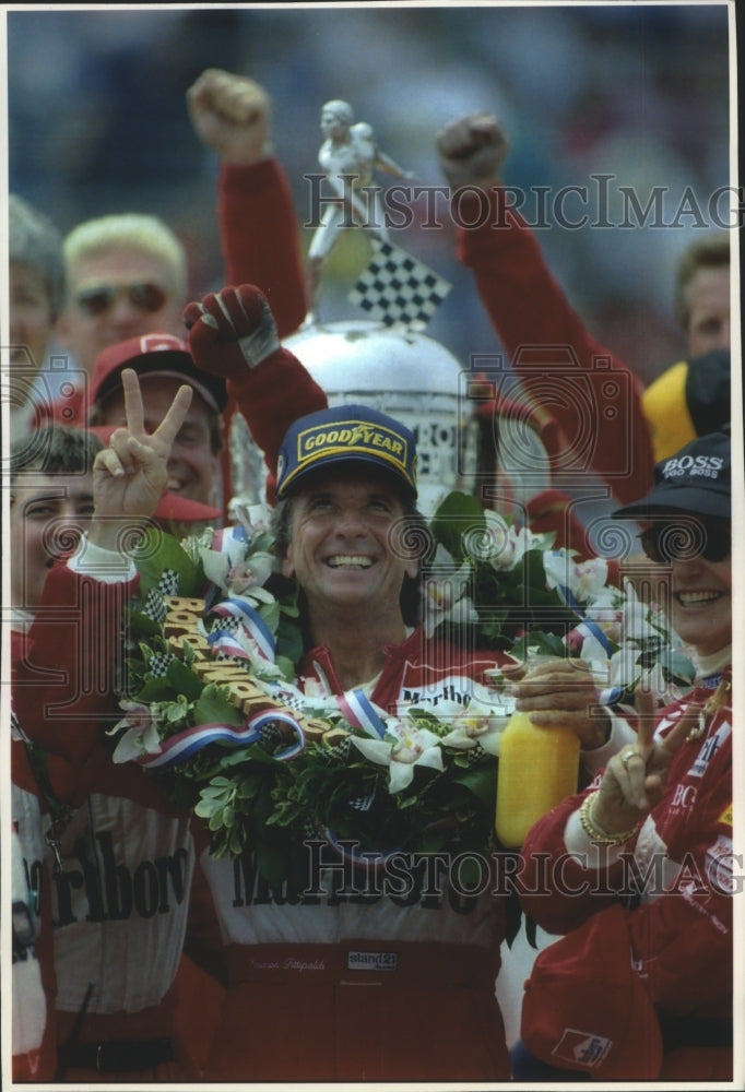 Press Photo Emerson Fittipaldi celebrating his Indianapolis 500 victory.- Historic Images