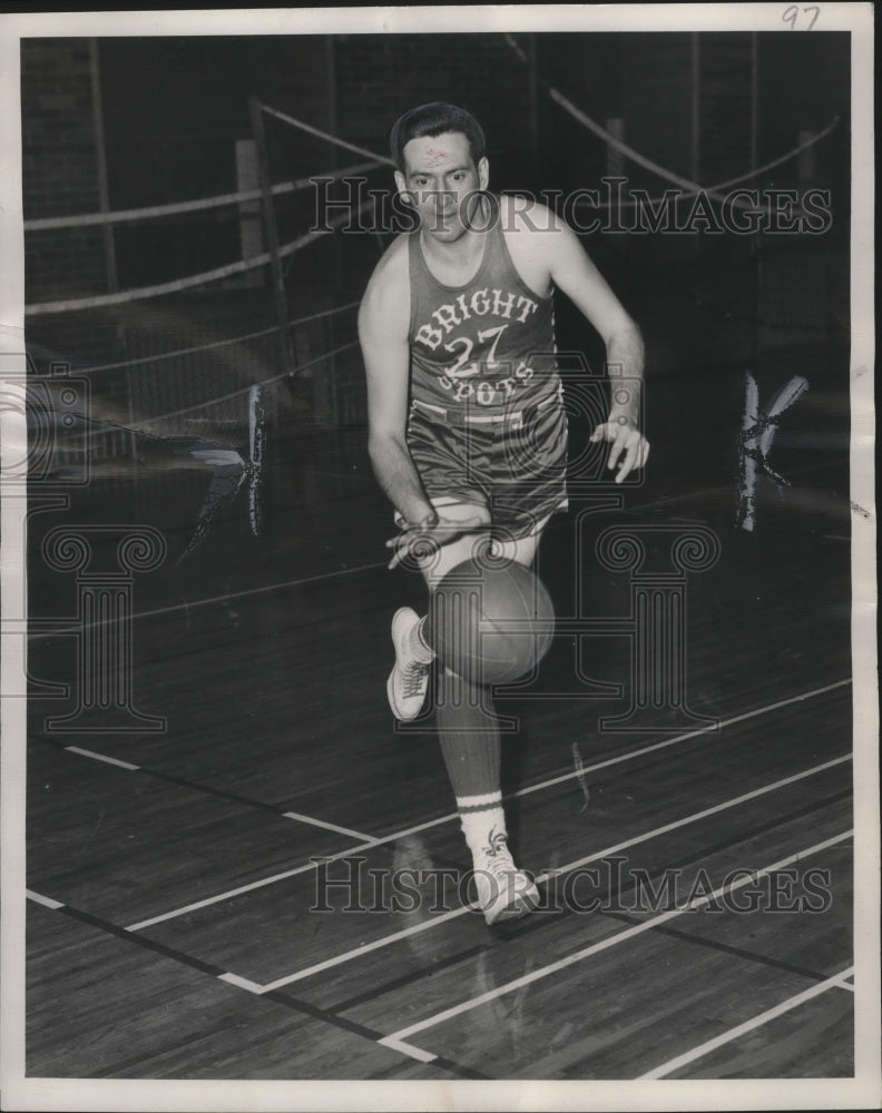 1949 Press Photo Milwaukee Bright Spots basketball player, Fred Rehm, with ball- Historic Images