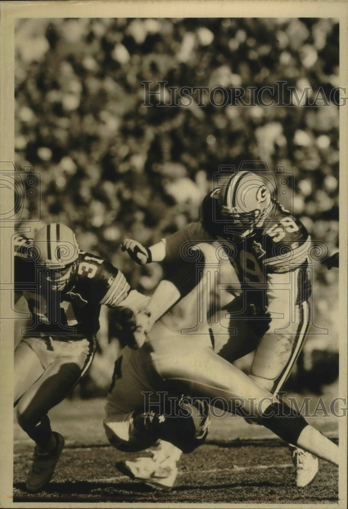 1993 Press Photo Green Bay Packers football players during game vs. the Raiders- Historic Images