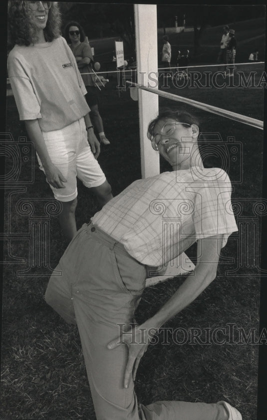 1993 Press Photo Kelly Heinritz competes in Family Olympics' limbo contest- Historic Images
