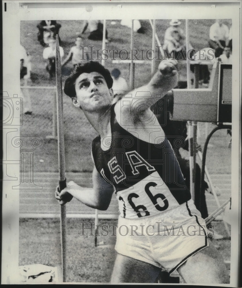 1967 Press Photo Frank Covelli throwing the Javelin in Winnipeg, Manitoba.- Historic Images