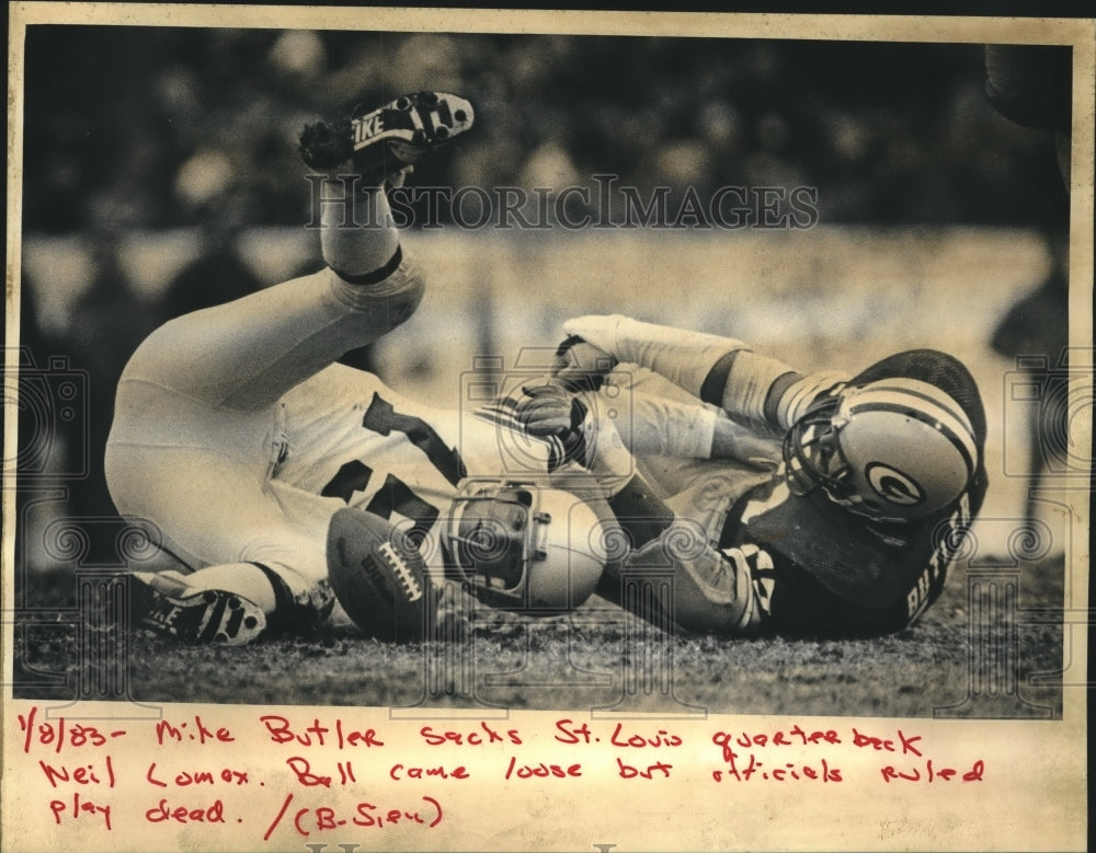 1983 Press Photo Mike Butler sacks St. Louis quarterback Neil Lomex, ball loose.- Historic Images