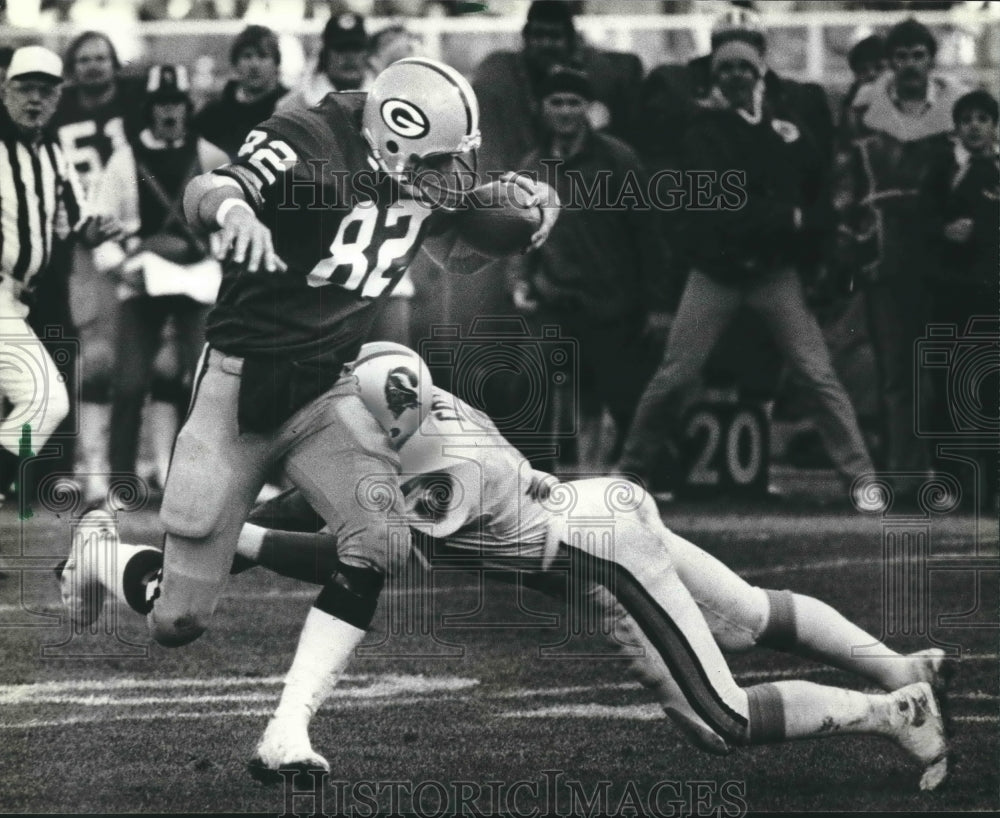 1980 Press Photo Packers Paul Coffman escapes Mark Cotney at County Stadium.- Historic Images