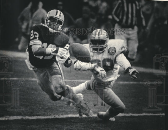 1983 Press Photo Detroit Lion player interfered with pass to John Jefferson..- Historic Images