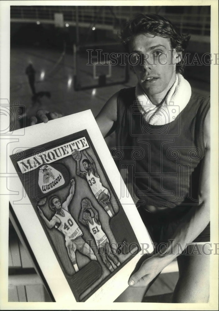 1976 Press Photo Marquette basketball player, Jim Dudley, displays his design- Historic Images