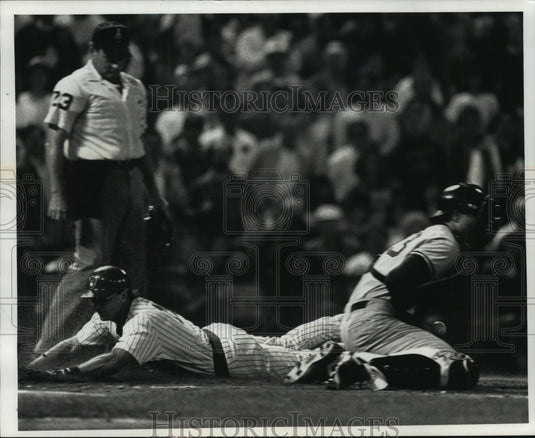 1985 Press Photo Milwaukee's Jim Gantner scores against the Yankees. - mjt09717- Historic Images