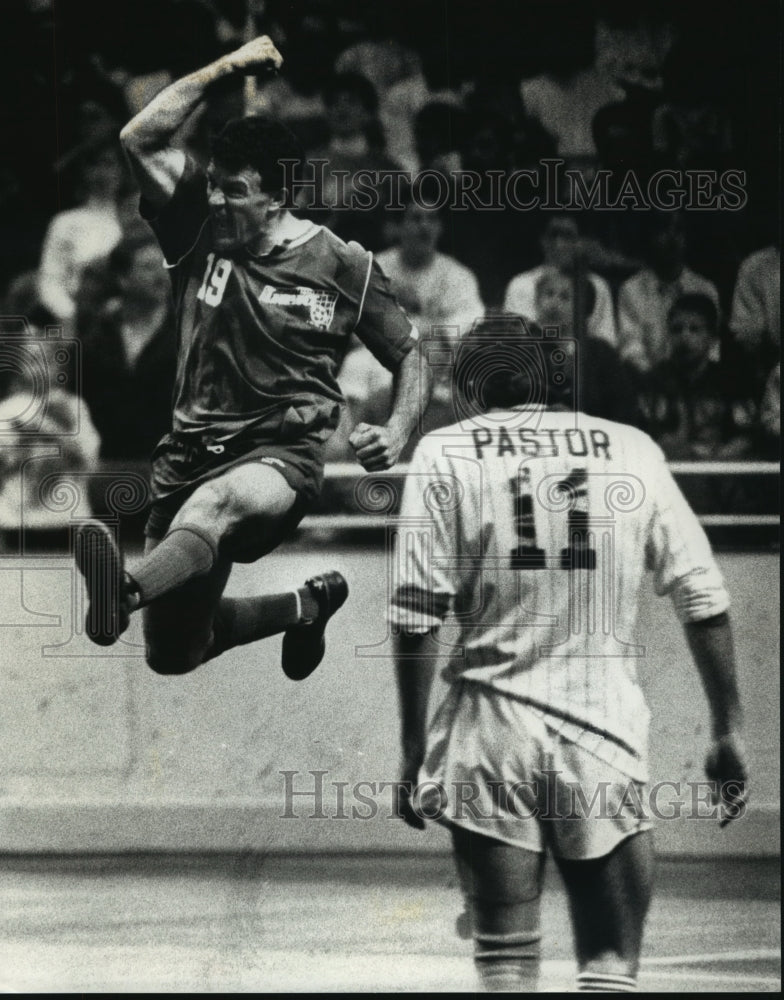 1990 Press Photo Paul Child celebrates making winning goal to beat Wave.- Historic Images