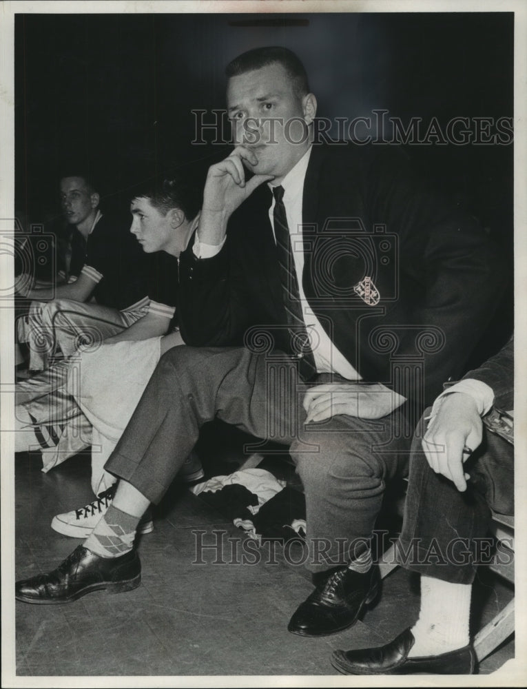 1963 Press Photo Glum Coach Jon Glaser watches his team in action. - mjt10702- Historic Images