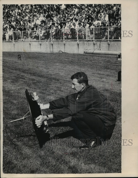 1969 Press Photo Man holds new type of microphone at Packers game - mjt10895- Historic Images