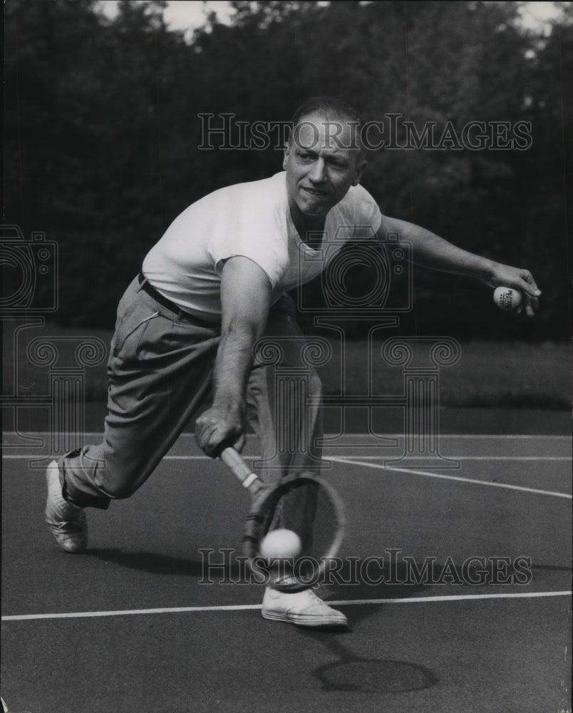 1953 Press Photo B. Johnson Jr.playing tennis. - mjt12038- Historic Images