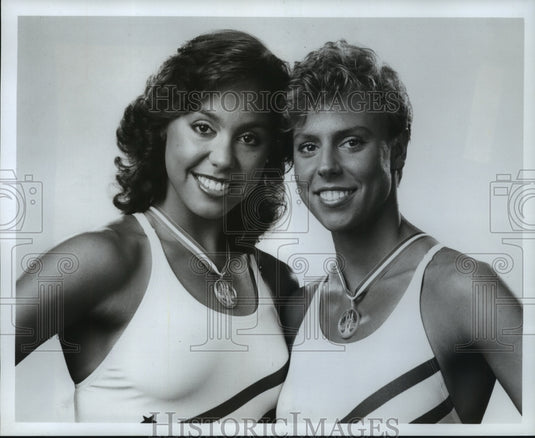 1984 Press Photo Synchronized swimmers Tracie Ruiz & Candy Costie; in Olympics- Historic Images