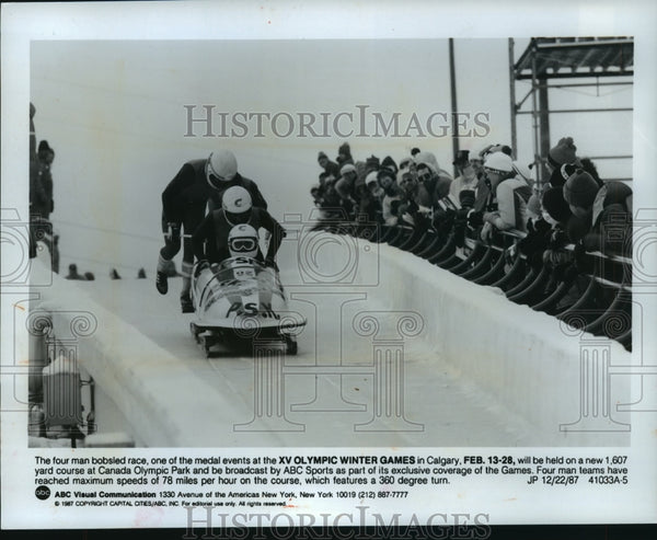 1987 Press Photo Spectators watch bobsled race at 1988 Winter Olympic ...
