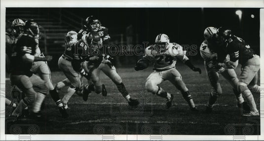 1989 Press Photo Catholic Memorial's Doug Inda (24) rushing with ball.- Historic Images